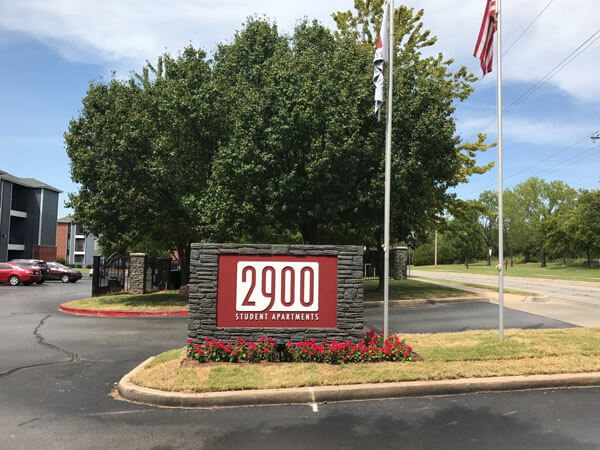 2900 Student Apartments monument sign