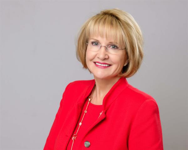 Catherine Monson smiles in a headshot