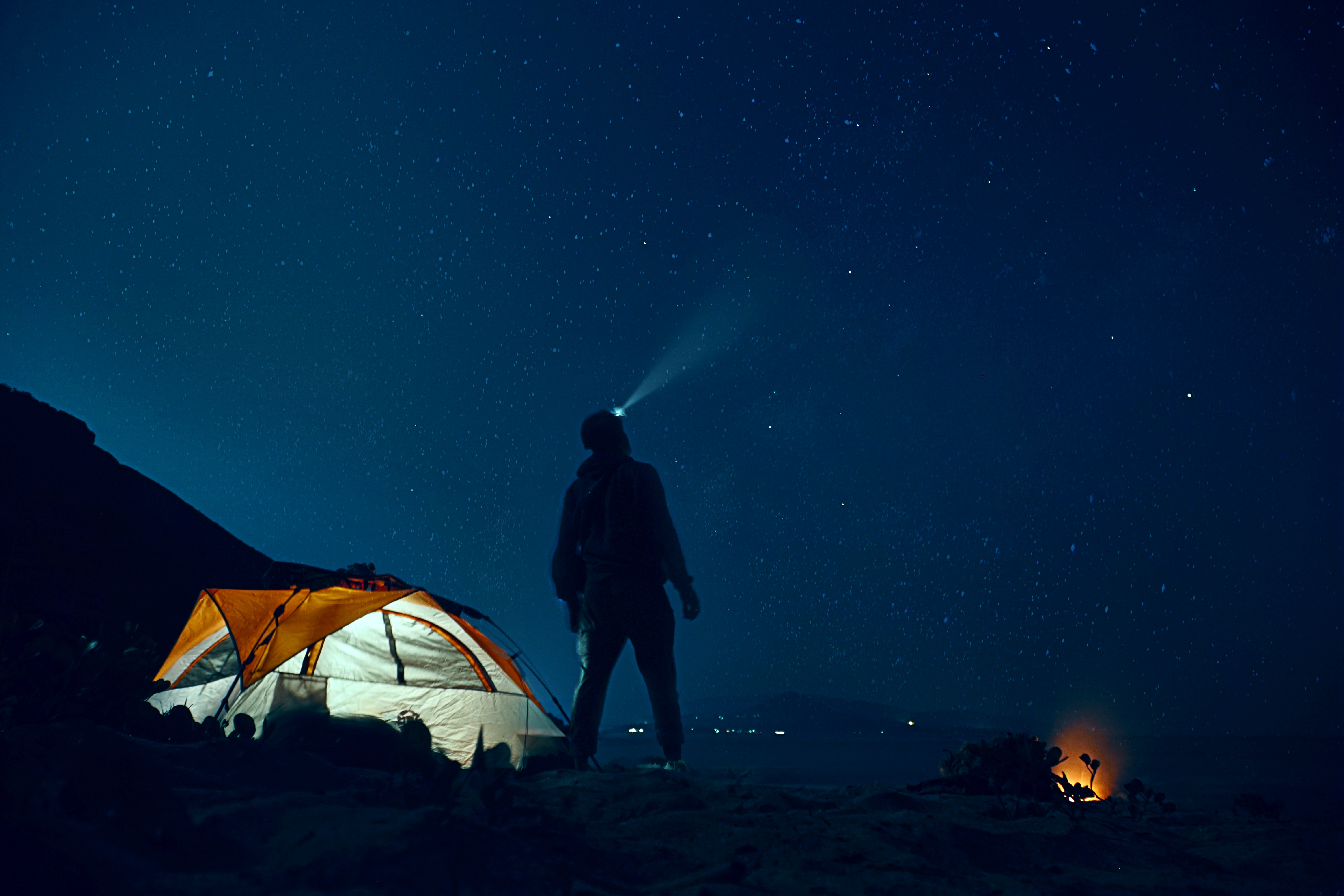 man looking at night sky