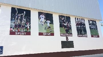 Signs On A Wall With A Smooth Surface