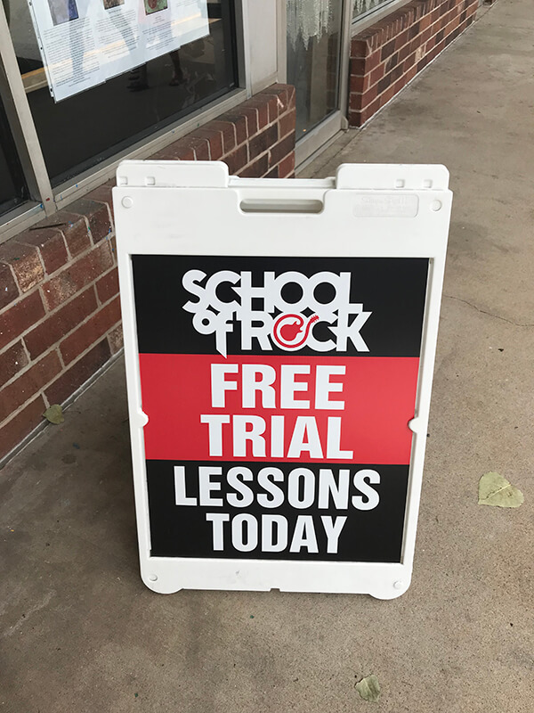 School of Rock sidewalk sign